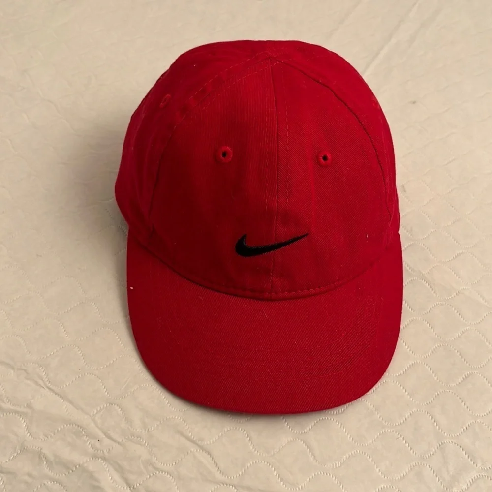 Nike red infant adjustable baseball hat with black swoosh